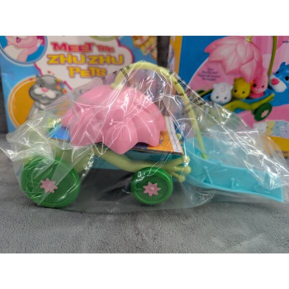 Zhu Zhu lot - babies hop along baby buggy NIB, 1 hampster & a book with stickers - Picture 3 of 13
